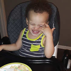 AJ enjoying his dinner 
