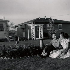 Aug 1, 1956 Joyce & Ronnie in backyard 8th Ave House