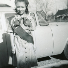 Joyce with her Girl Scout uniform, about 1957