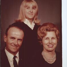Joyce with Frank (Dad) and Mott (Mom) High School Graduation 1965
