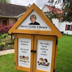 This "Joyce's Little Library" is on our front lawn.  A second one is at Stonybrook Church.
