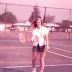 Joyce in tennis class, Excelsior High School
