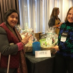 Joy with 2 baskets of MA Goodies for the Northeast Conference Raffle 