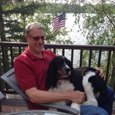 John celebrating the 4th of July  with Desi on their deck in AK