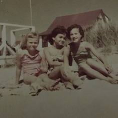 Judy on the beach in the middle with her cousins