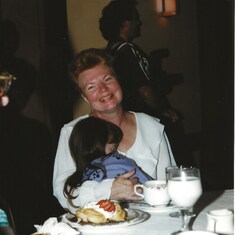 Judy and a sleepy little Stephanie at Lori and Dean's rehearsal dinner in Boston.  October 10, 1997