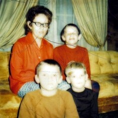 My Mom with Me on the lower right. ANd My brothers Todd upper right and Barry lower left. 1975