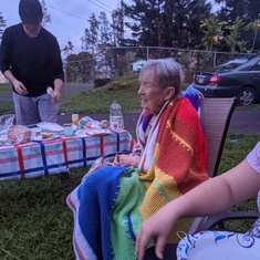 Grandma around the campfire to make smores