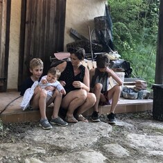 Julian (trying hard to escape the hold!) and cousins, June 2018.