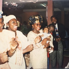 Princess carrying Patrick Zik Uduma during his christening