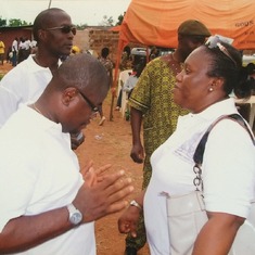Princess with Nnanna during her father's burial.