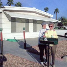 June and Maxine in front of their new home at Palm Desert Greens
