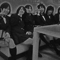 Junko Furuta and her classmates smiling.