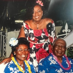 Grandpa and Grandma with first born, sister Yejide at her 50th Birthday party.