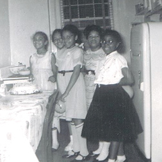 Karabelle, second from left, at the 8th birthday party of her best friend June, left