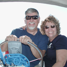 Bill and Karen Sailing On Their "Gotta Hab-it" Boat