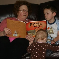Karen reading to her grand-kids (Evan & Aaliyah) December 2008.