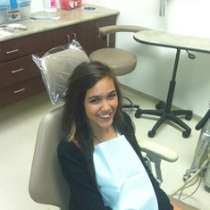 Kariss at the dentist, she looks happy but she wasn't, she hated being there.