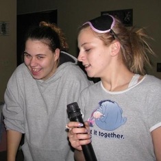 Kasandra and her sister, Kayla singing on her new Karaoke machine