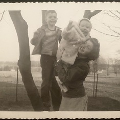 On the farm, age about 11, with brother Dan and baby sister Gretchen