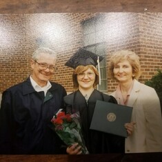 Jim and Kathy with daughter Mary at her Graduation from Eastern Michigan University 