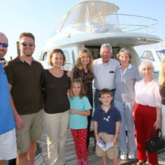Kathie and Jack on their boat in 2010 with Jon, Chuck, Sophie, Ellie, Chrissie, Danny, Nanny, and Maria