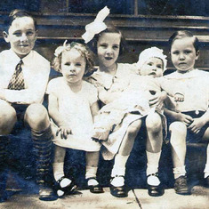 Bill, Joan, Marge, Kath, and Tom on the front porch in 1934
