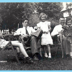 Tom, Bill, Kath, an unknown man, Connie, and Bobbie on Ferne Avenue in 1940
