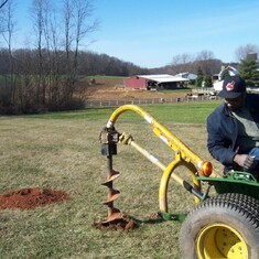 Oscar digs a post hole for the Maryland pony pasture