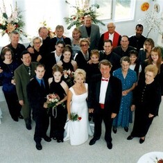 (In the blue dress) at Revett's wedding to Shaune