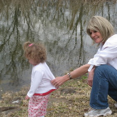 Grammy with Mylie Thomas, at Lake Texhoma lakehouse pond. Grammy chased Mylie all over the place that day.