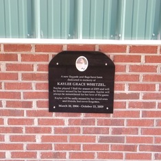 This is a plaque that was placed at the East Hardy Little League field in memory of Kaylee Grace. Kaylee Grace, you will never be forgotten and will always be cherished in our hearts. Love, PapPap.