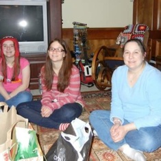 Kayley with her Mom and Amanda at Christmas time.