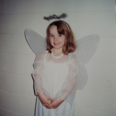 Angel Kayley in a school program.