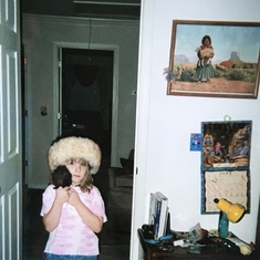 Kayley in my room with all the fuzzies in June 2002