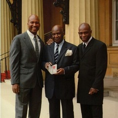 Dad and his brother (Uncle Yinka) with Grandad