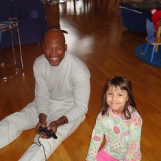 My daughter giving Ky a training session on PS2 