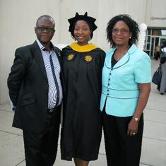 Kehinde and her parents celebrating her Master's graduation