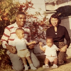 Keith (youngest child) with father, EP, brother Anthony and mother Josephine.