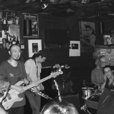 Almost Transparent Blue at Lady Jane, Tokyo, July 2002, with John Masayoshi Anzai on sax, Sky Brooks on drums, and Masahico Shimaji on bass as a special guest. Also the back head of Kelly's father on the photo.