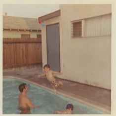 Kelly leaping into uncle Kenny’s arms Hal swimming Santa Anna California 1967