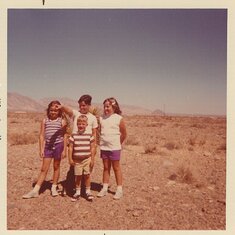 Kelly Hal and cousins in desert right behind home home facing northwest toward Tonopah NV now homes
