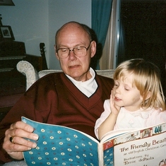 Reading to granddaughter, Livia