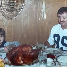 One Thanksgiving picture of my dad and my brother, Joel