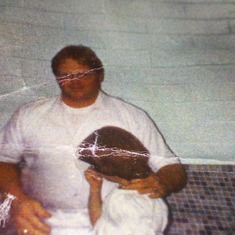 Dad baptizing me in Gulf Breeze Florida.