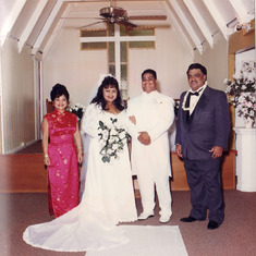 My mom, New husband and dad on my wedding day May 1997