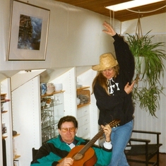 Ken Playing Guitar and Lynn doing Jig on Seine River in France 1993
