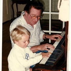 Teaching Austin to play Piano