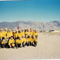 Kenton and his crew. Denio Fire.  You can see the burn on the mountain behind them. Denio, NV Aug 1995
