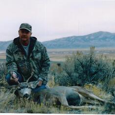 Kenton and his tasty little buck. Ruby Mountains, NV  Oct 2003